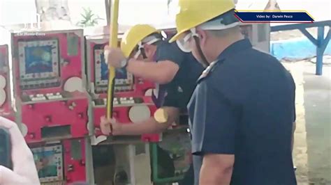 56 video karera machines destroyed in Camp Crame .